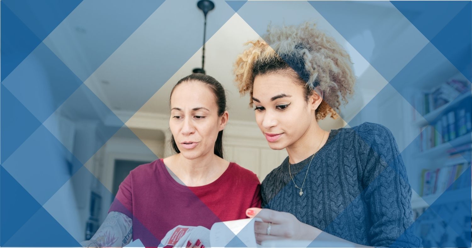 two women trying to file their taxes