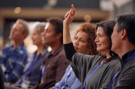 Woman raising her hand