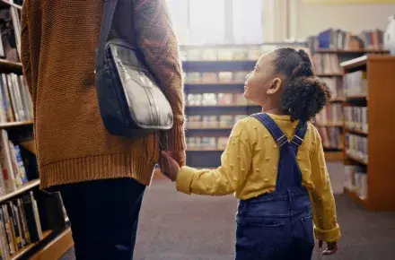 Mom and daughter walking.