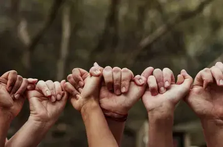 Holding hands.