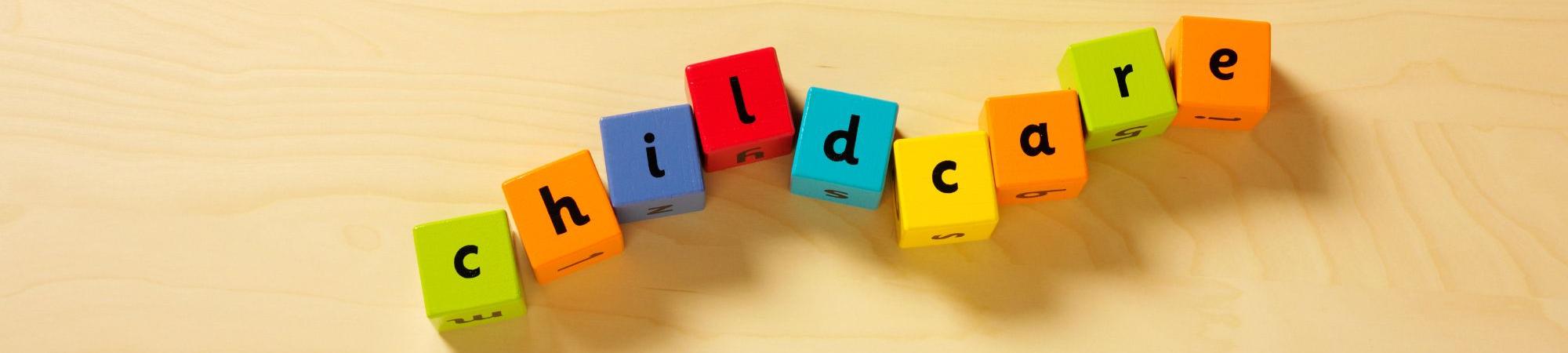 Building blocks with letters spelling the word "childcare"