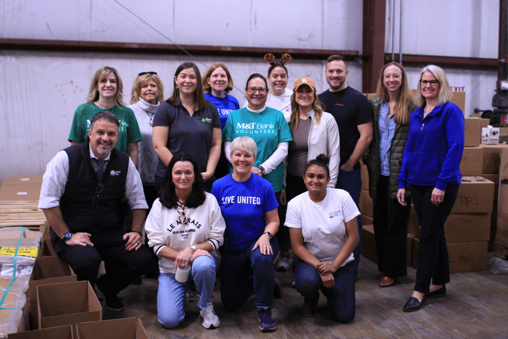 Group shot volunteering at Maple Press.