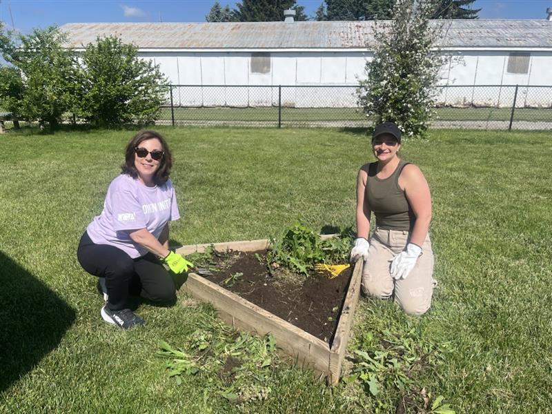 Two members gardening at JCC.