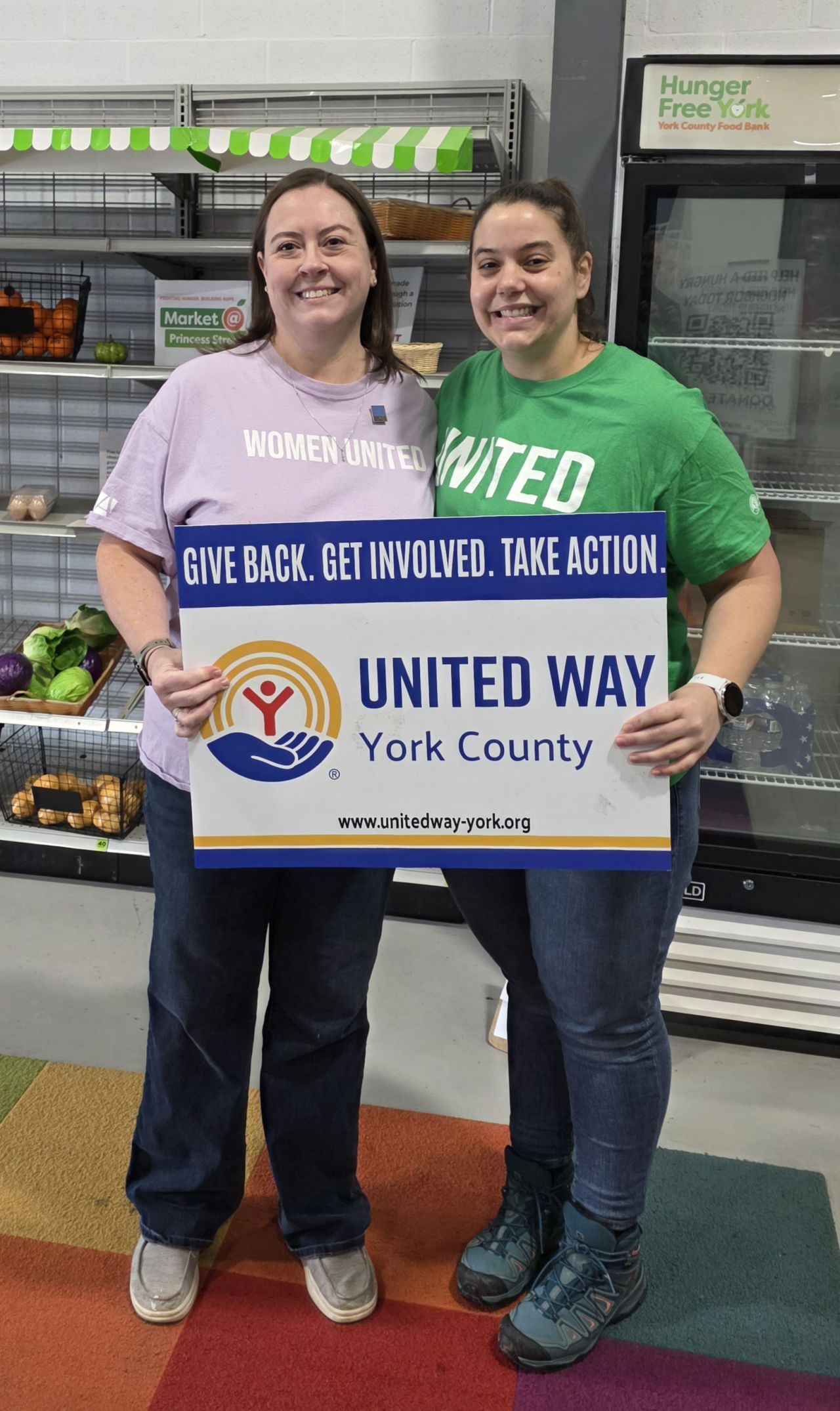 Women United members volunteering.