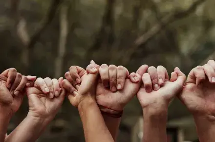 People holding hands together